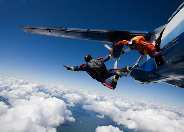 Depositphotos 9382865 Stock Photo Two Skydivers Jumping From Airplane (1)